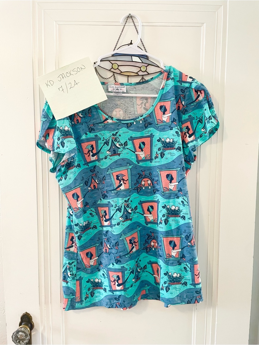Blue Platypus Whimsical Teal Graphic Tee with Coral Accents
